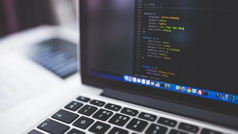 Monitor displaying code.
